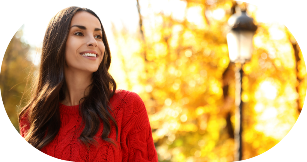 woman in red sweater smiling and learning about MD MATT