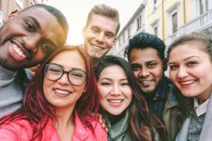 group of people in a selfie discussing LGBTQ friendly addiction treatment